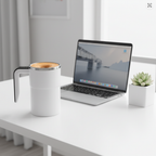 Magnetic stirring mug on office desk