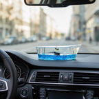 Liquid wave cruise ship ornament on car dashboard